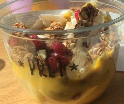 Mango and banana smoothie with granola